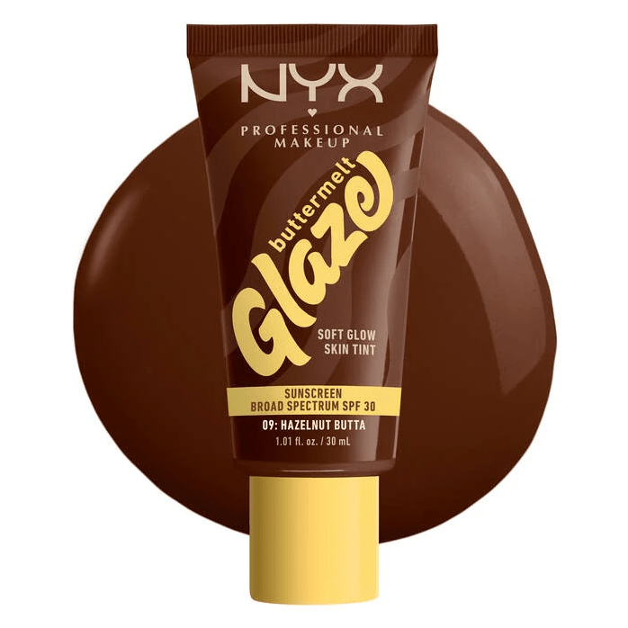 Glamour Us_NYX_Makeup_Buttermelt Glaze Soft Glow Skin Tint SPF30_Hazelnut Butta_BMT09 The best affordable Latina and Mexican makeup, beauty and cosmetics supply store in Chula Vista, San Diego