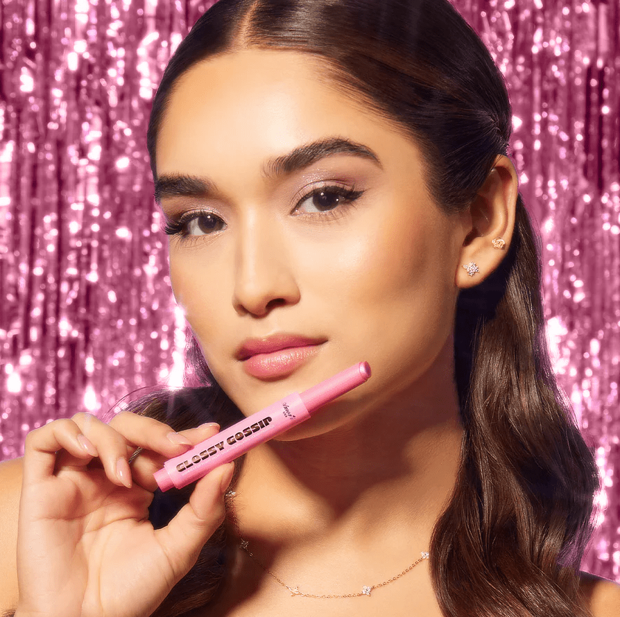 Glamour Us_Amorus_Makeup_Glossy Gossip Shimmer Lip Plump Balm_Peach Rumor_CO-GCL-01 The best affordable Latina and Mexican makeup, beauty and cosmetics supply store in Chula Vista, San Diego